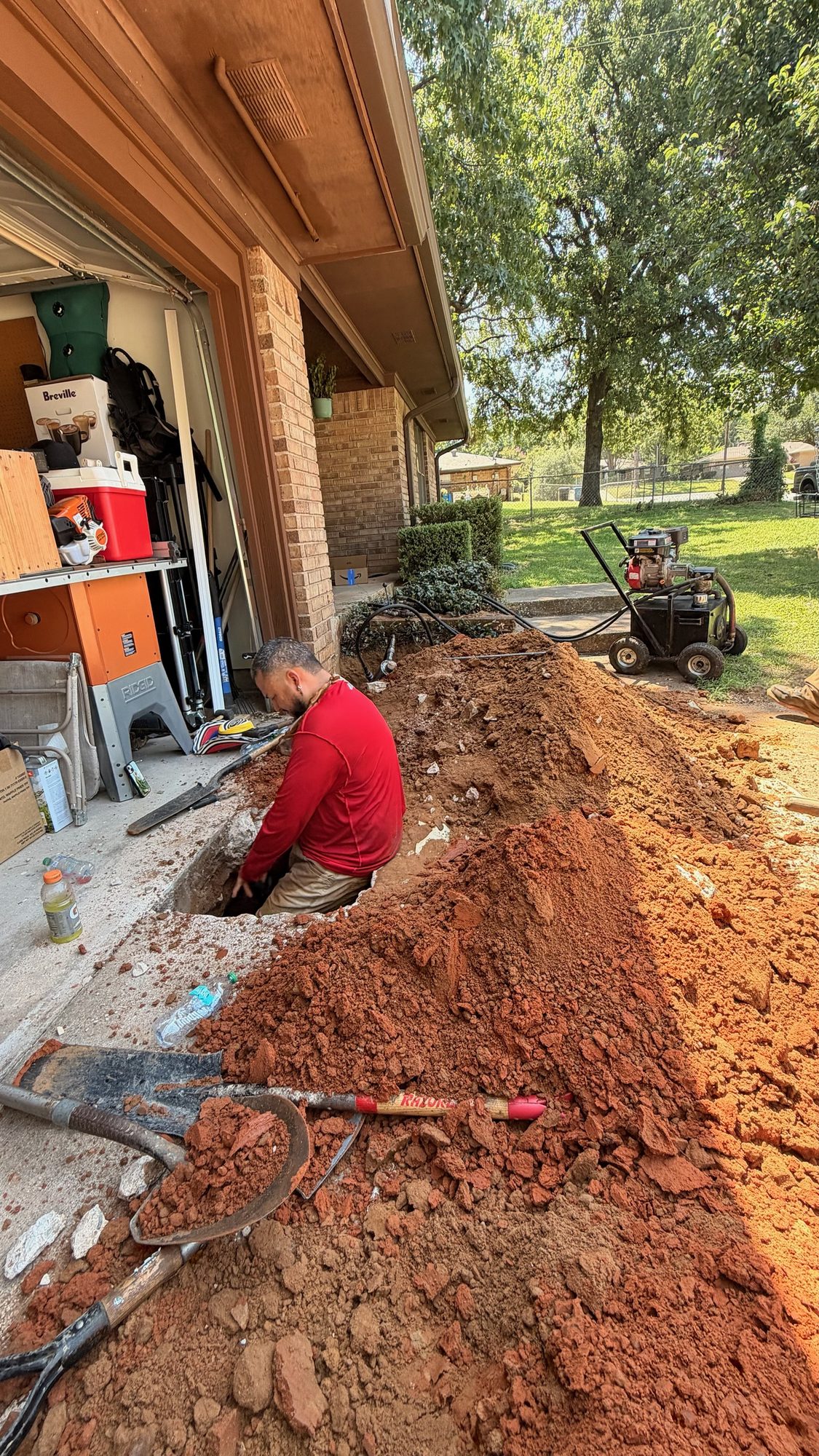 Trench garage excavation, Imperial Foundation Repair job site in North Texas