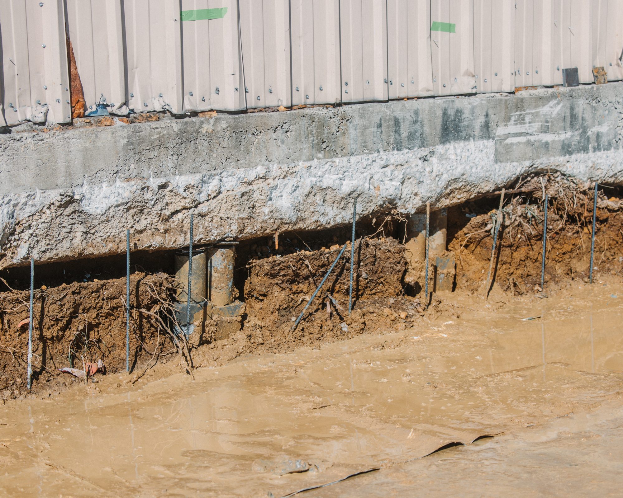 Warehouse pier line, Imperial Foundation Repair job site in North Texas