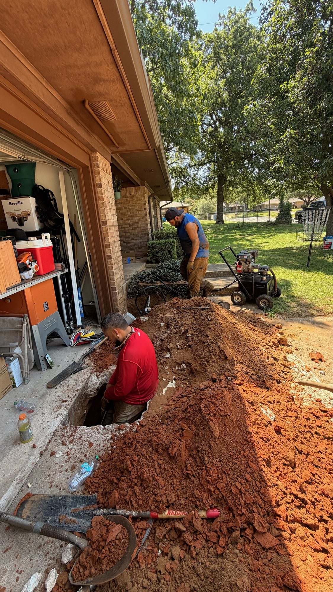 Trench garage excavation, Imperial Foundation Repair job site in North Texas