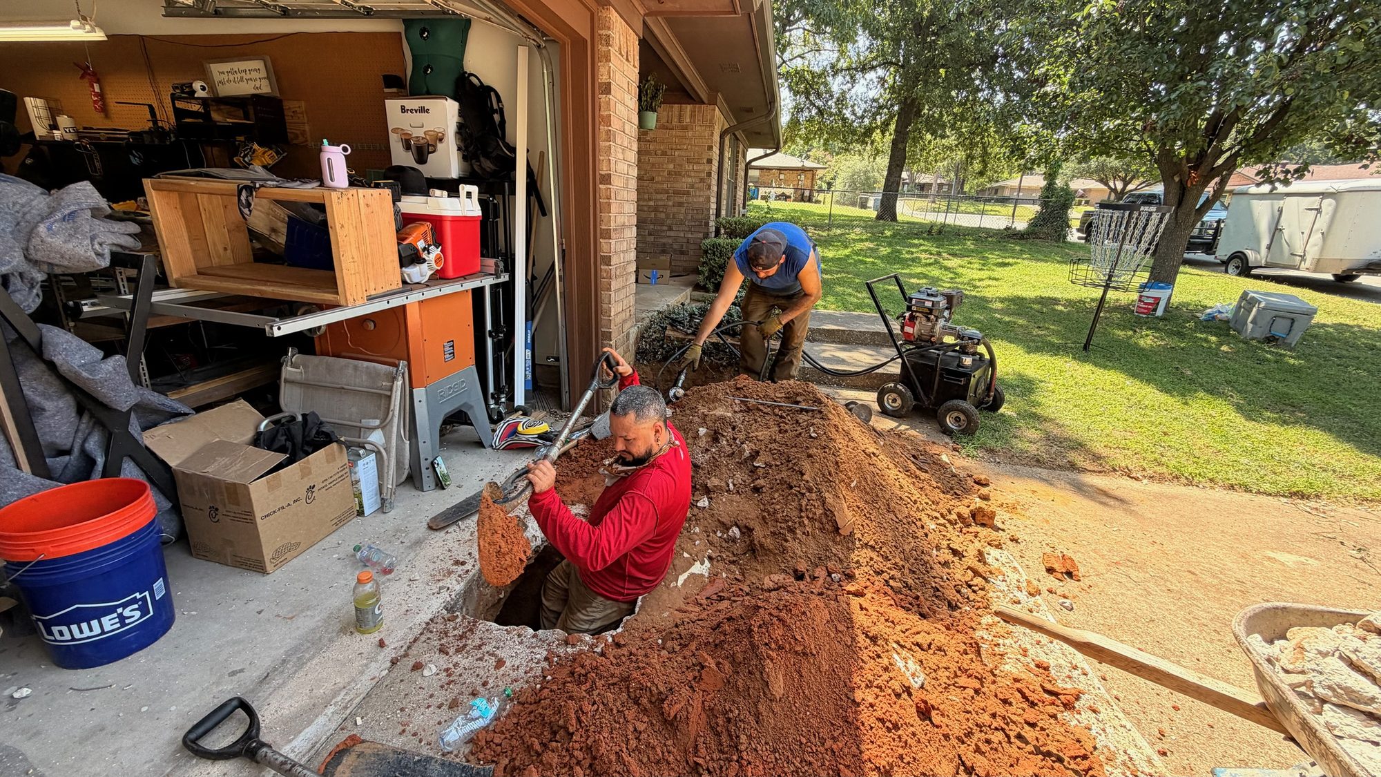Trench garage excavation, Imperial Foundation Repair job site in North Texas