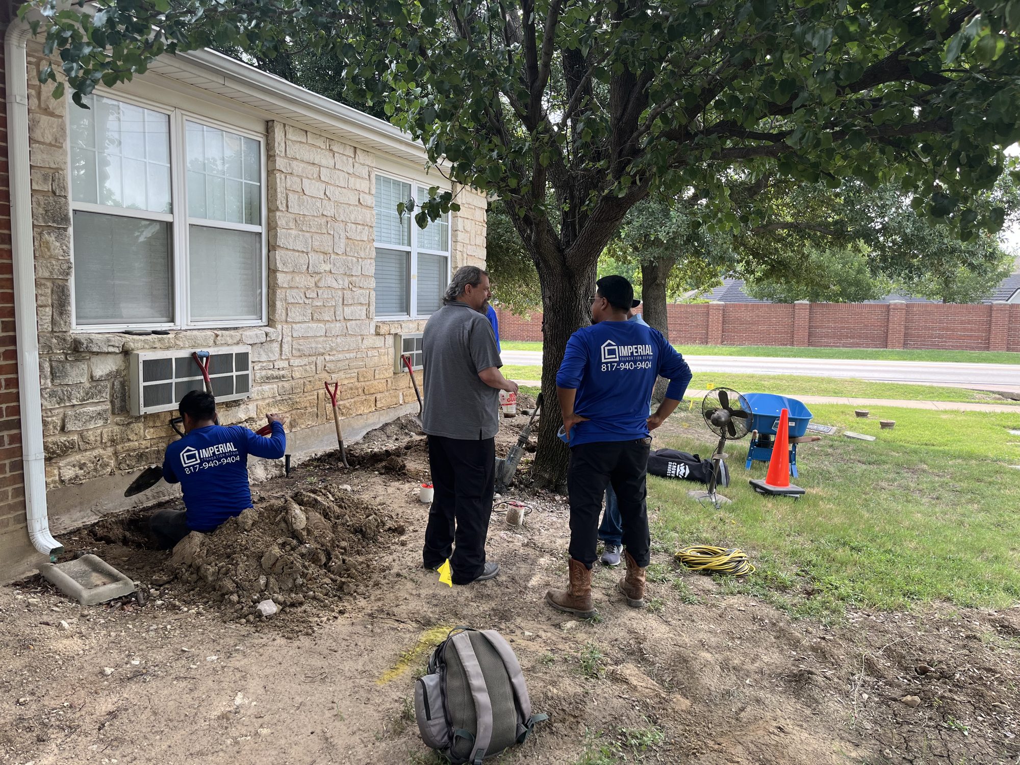 Crew and homeowner onsite, Imperial Foundation Repair job site in North Texas