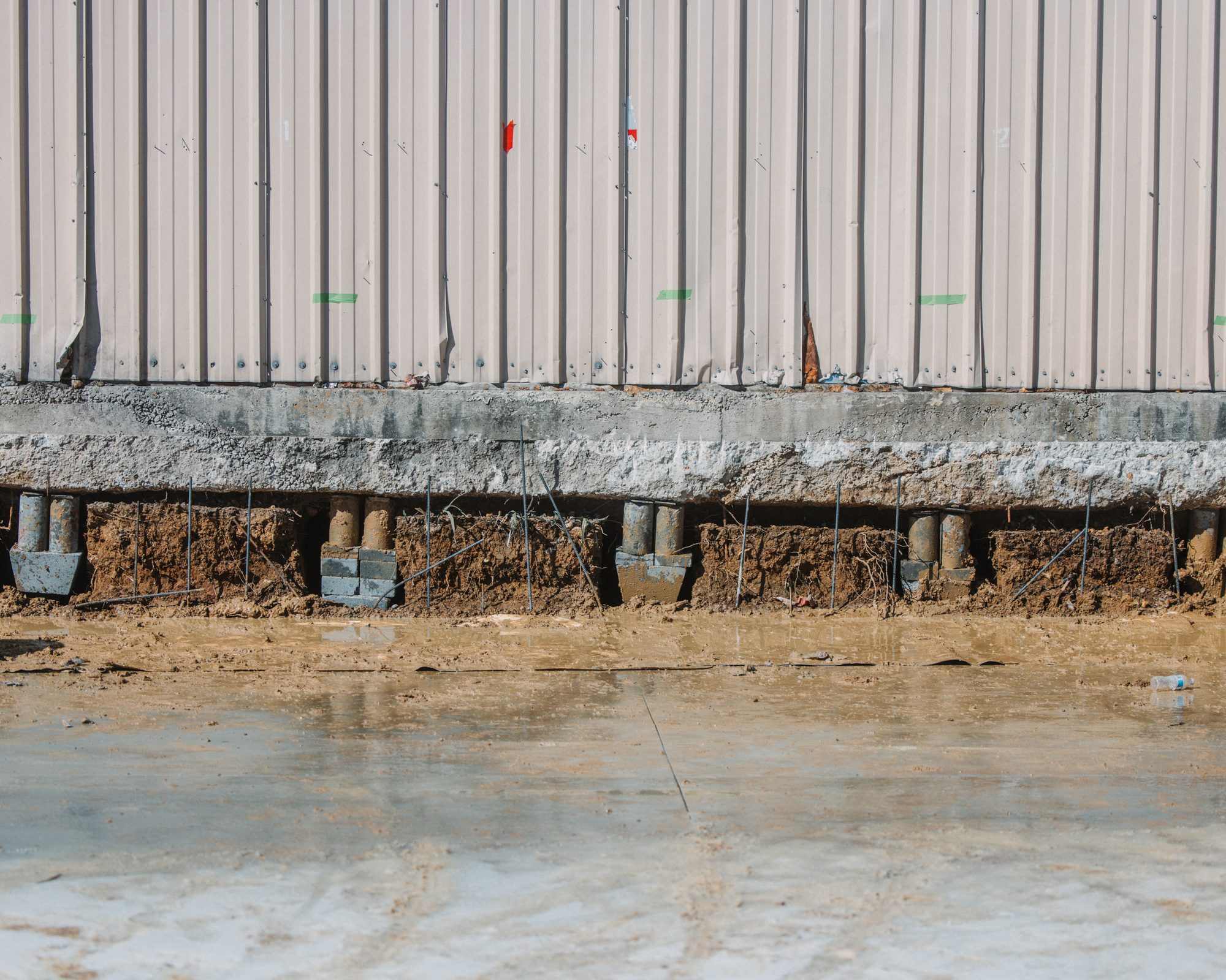 Warehouse pier line, Imperial Foundation Repair job site in North Texas