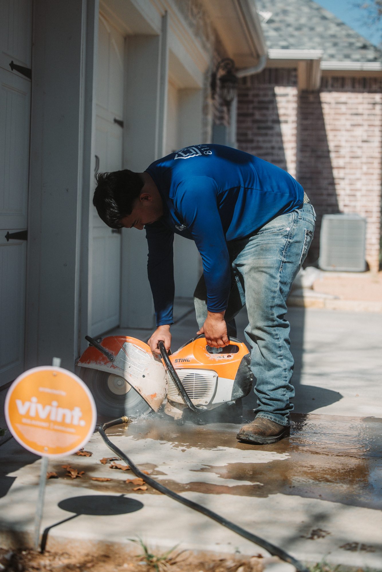 Concrete cutoff saw, Imperial Foundation Repair job site in North Texas