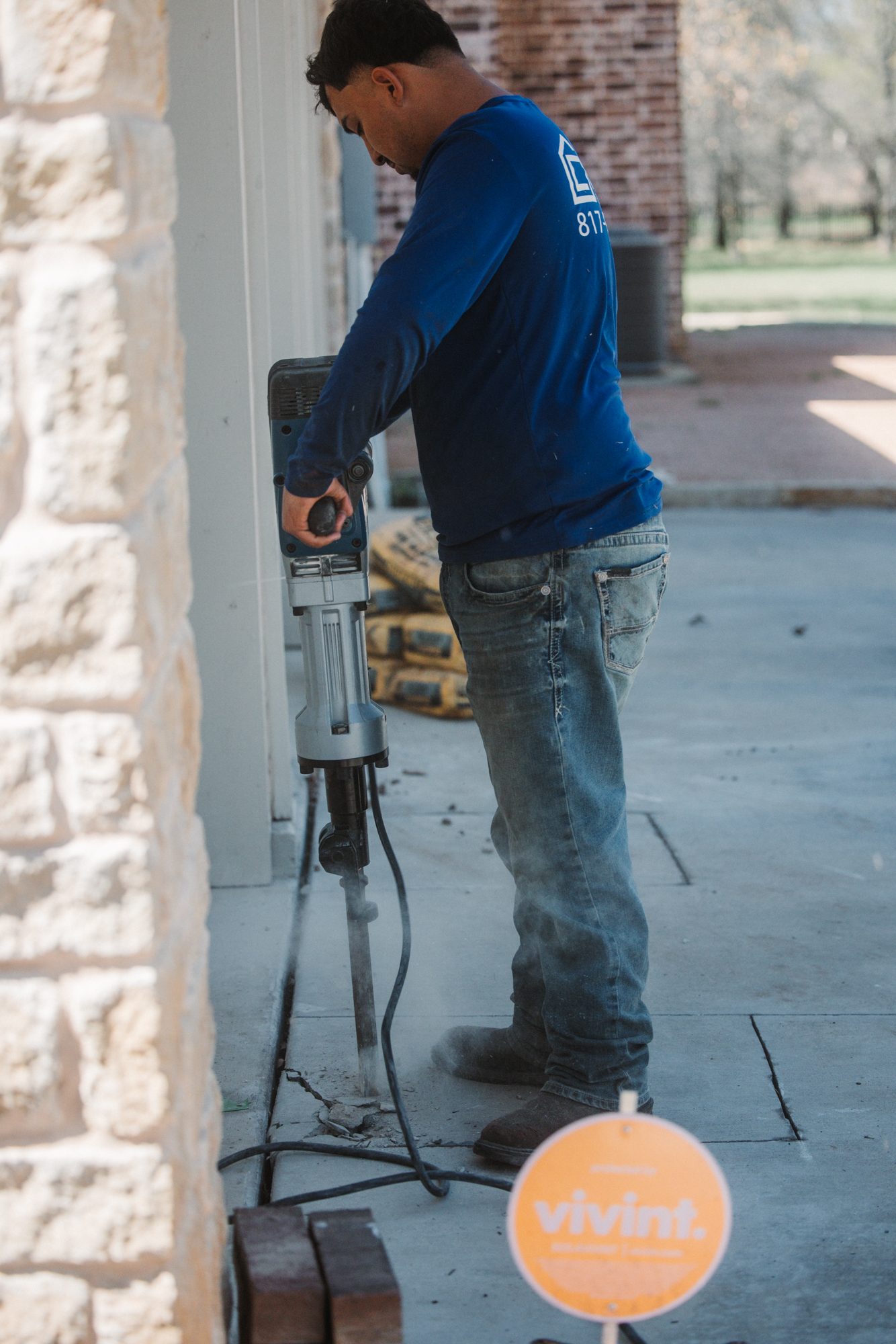 Jackhammer porch, Imperial Foundation Repair job site in North Texas