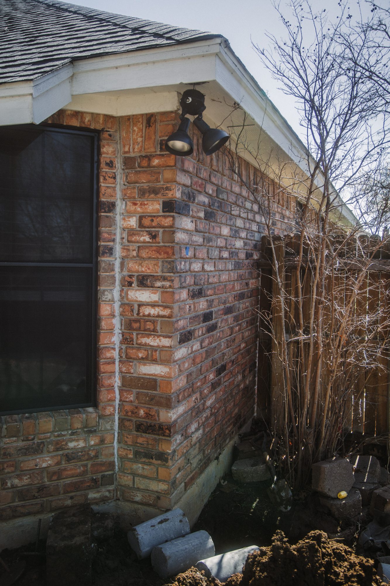 Pier at grade brick corner, Imperial Foundation Repair job site in North Texas