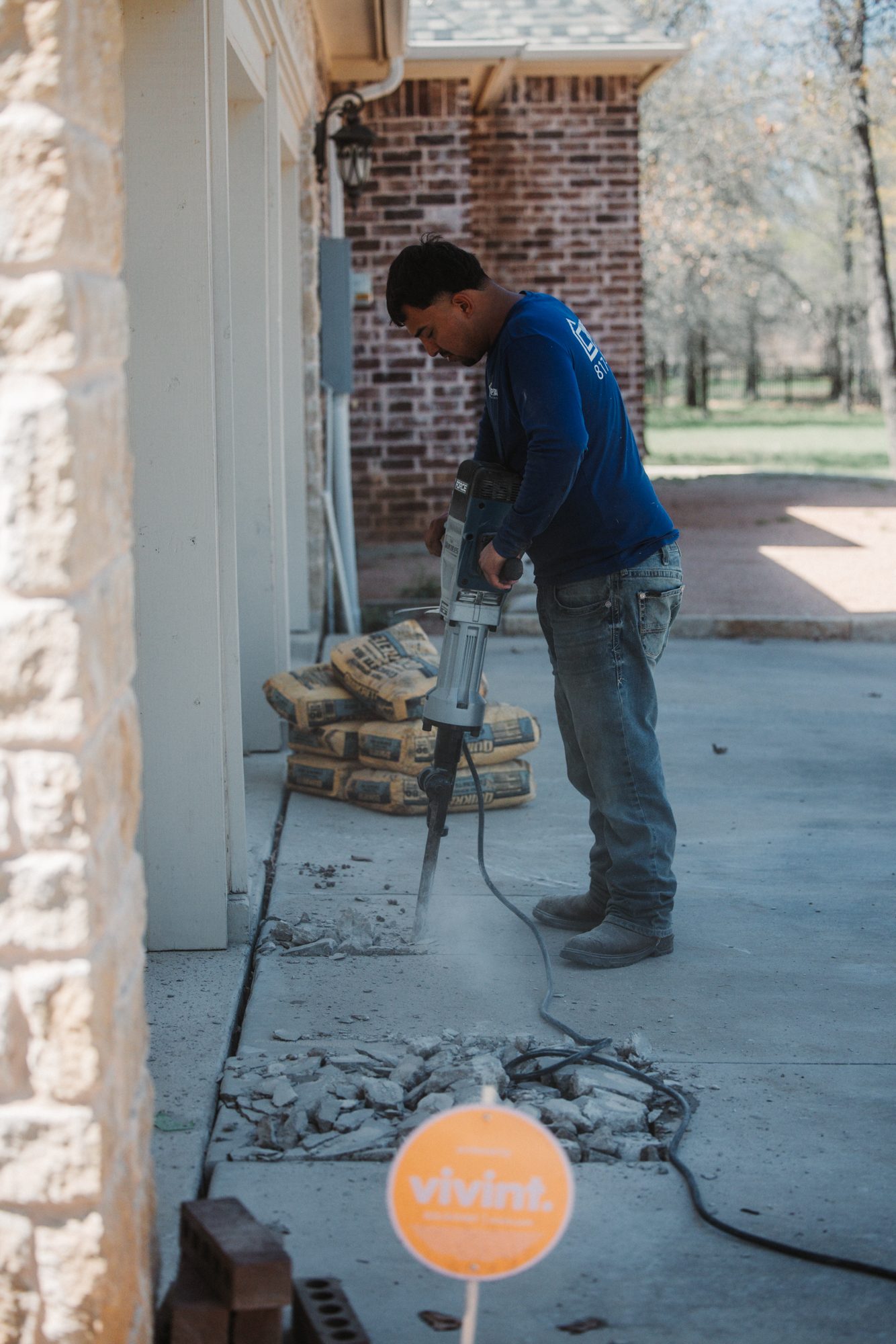 Jackhammer porch, Imperial Foundation Repair job site in North Texas