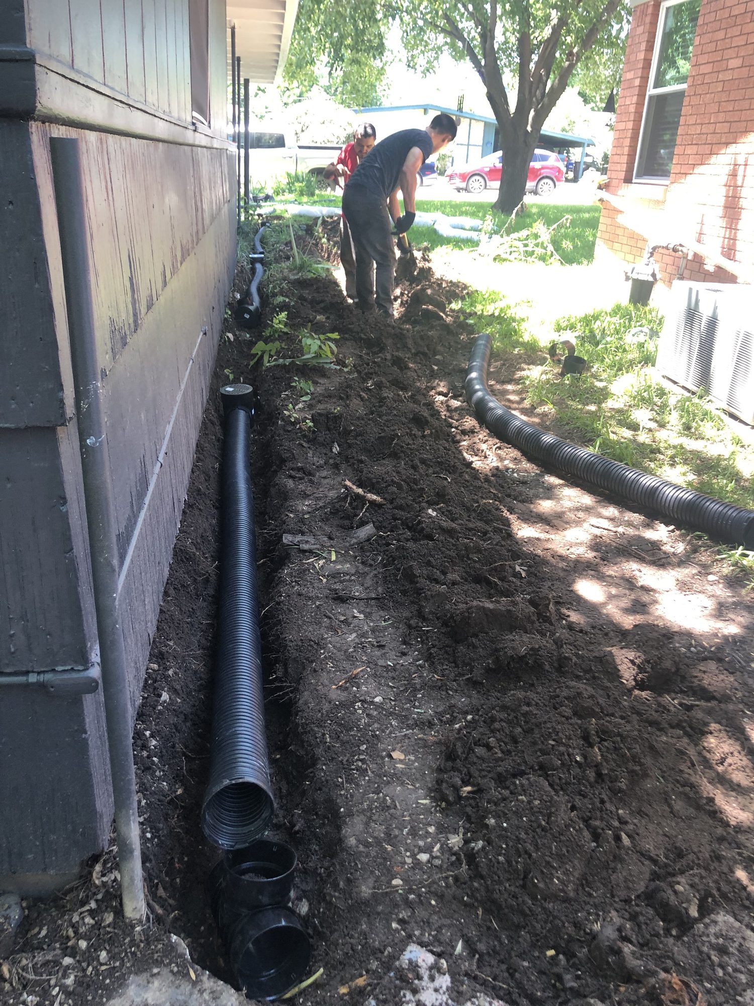 Corrugated drain pipe trench, Imperial Foundation Repair job site in North Texas