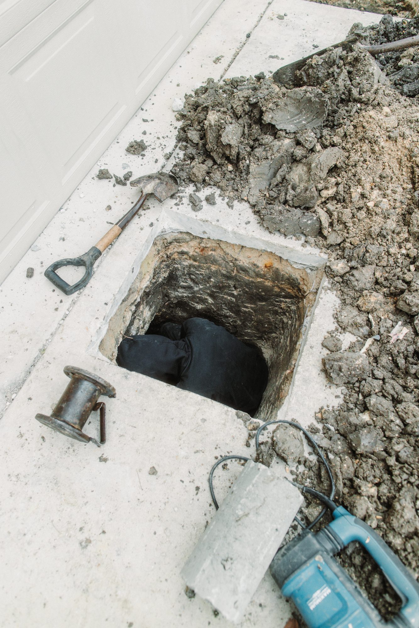 Pier hole with ram, Imperial Foundation Repair job site in North Texas